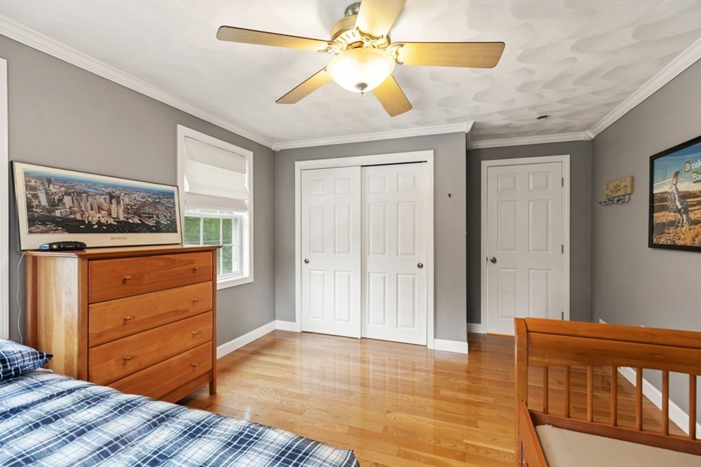 9 Campbell Road Billerica, MA 01821 - Photo 18 of 31 a bedroom with a bed and a dresser