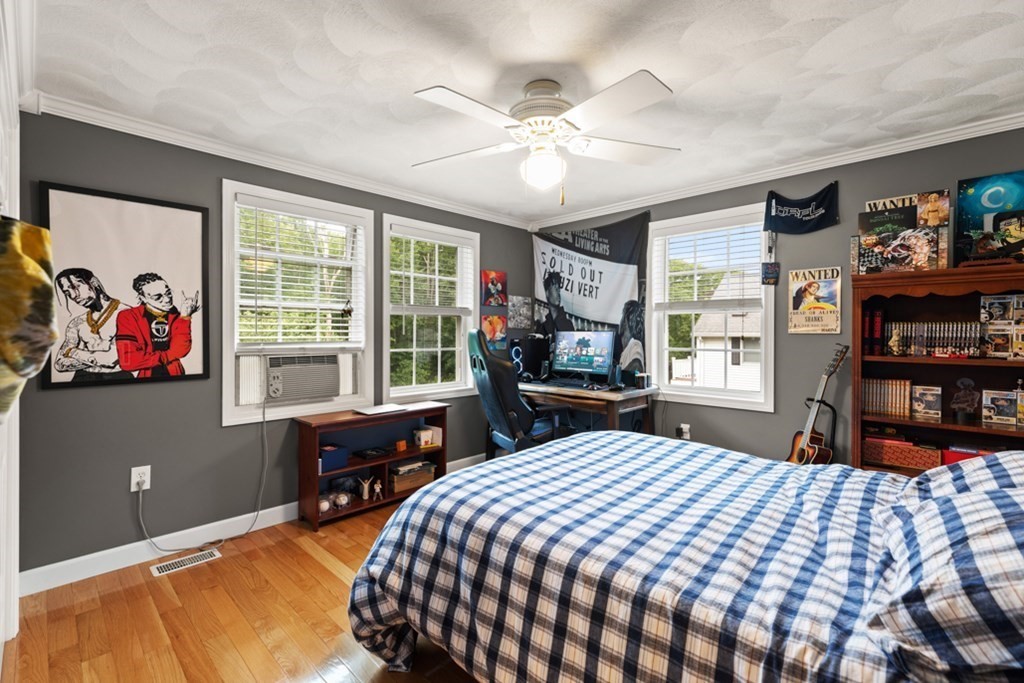 9 Campbell Road Billerica, MA 01821 - Photo 21 of 31 a bedroom with a large bed and a window