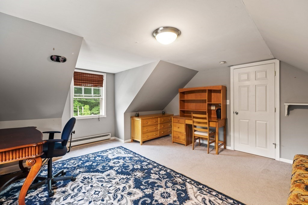 9 Campbell Road Billerica, MA 01821 - Photo 24 of 31 a bedroom with furniture and a window