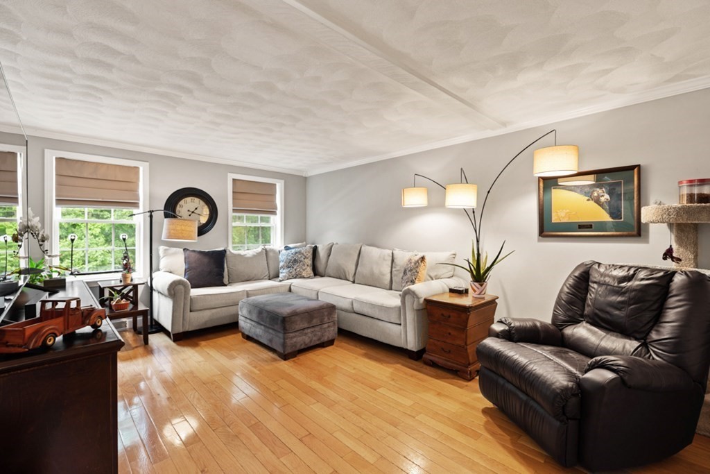 9 Campbell Road Billerica, MA 01821 - Photo 7 of 31 a living room with furniture and a large window