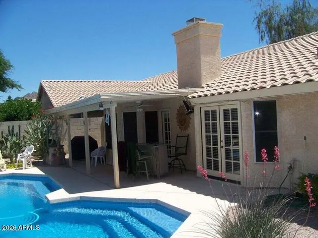 a view of a house with patio