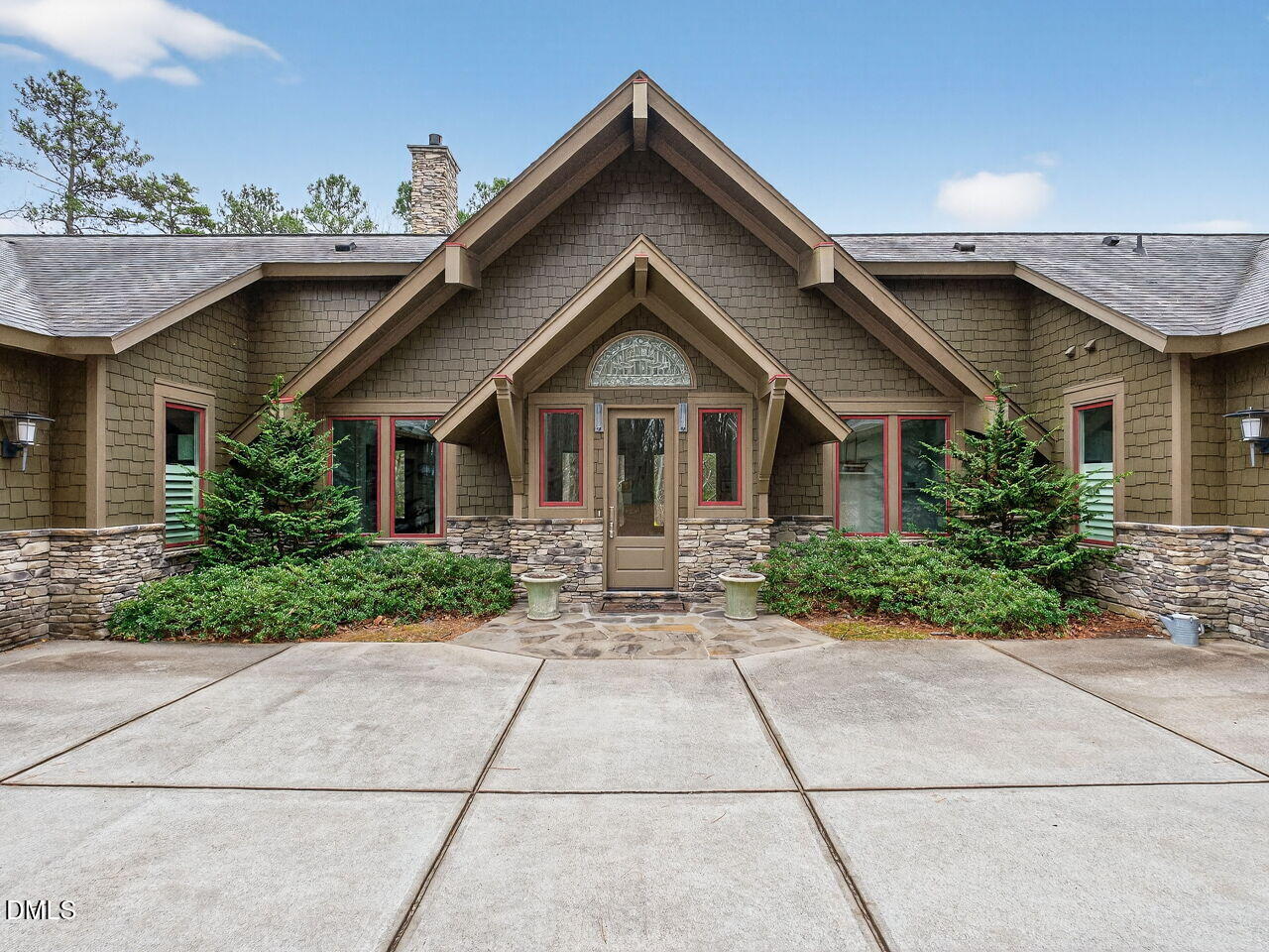 7516 Apex Barbecue Road Apex, NC 27502 - Photo 32 of 41 a front view of house with yard and trees around