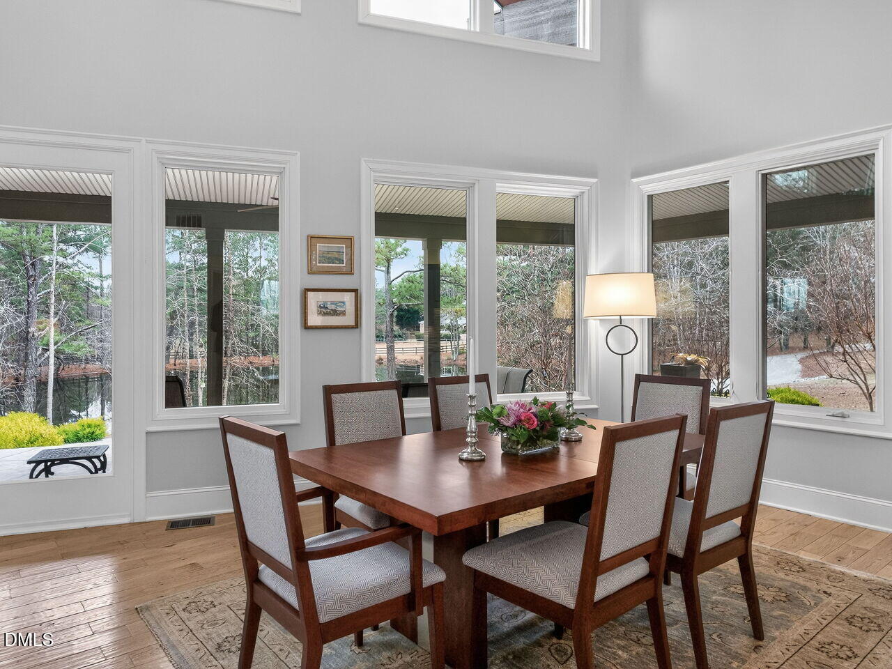 7516 Apex Barbecue Road Apex, NC 27502 - Photo 8 of 41 a view of a dining room with furniture window and outside view