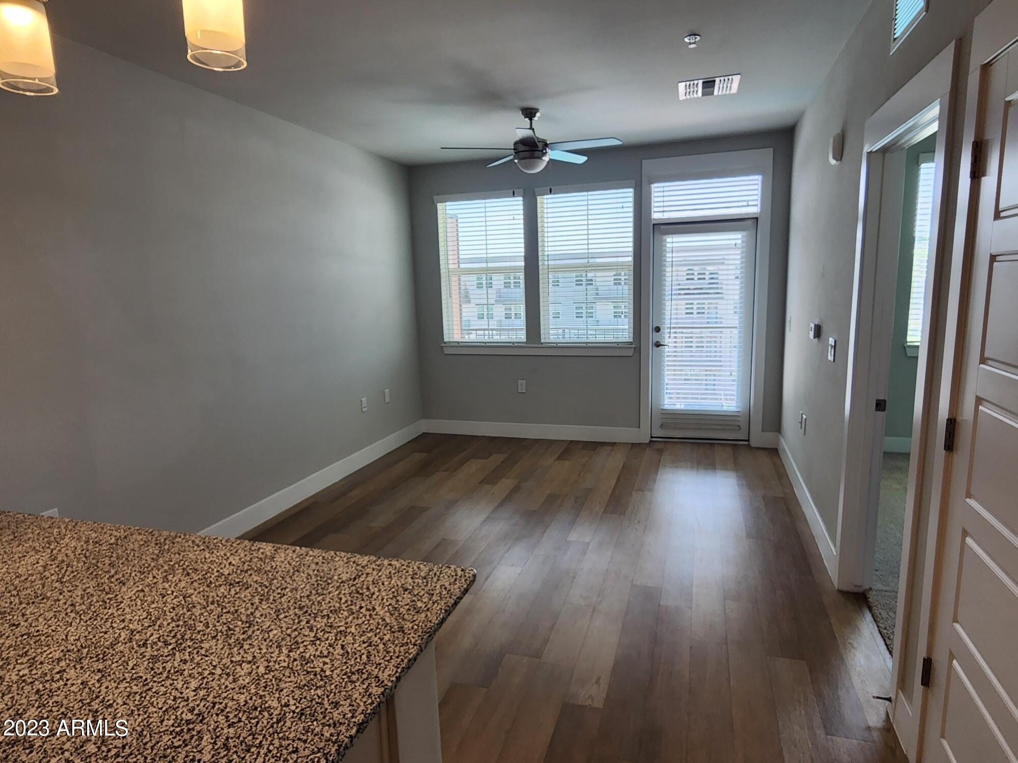 1375 North 145th Avenue, Unit A1 Goodyear, AZ 85395 - Photo 2 of 23 Living Room