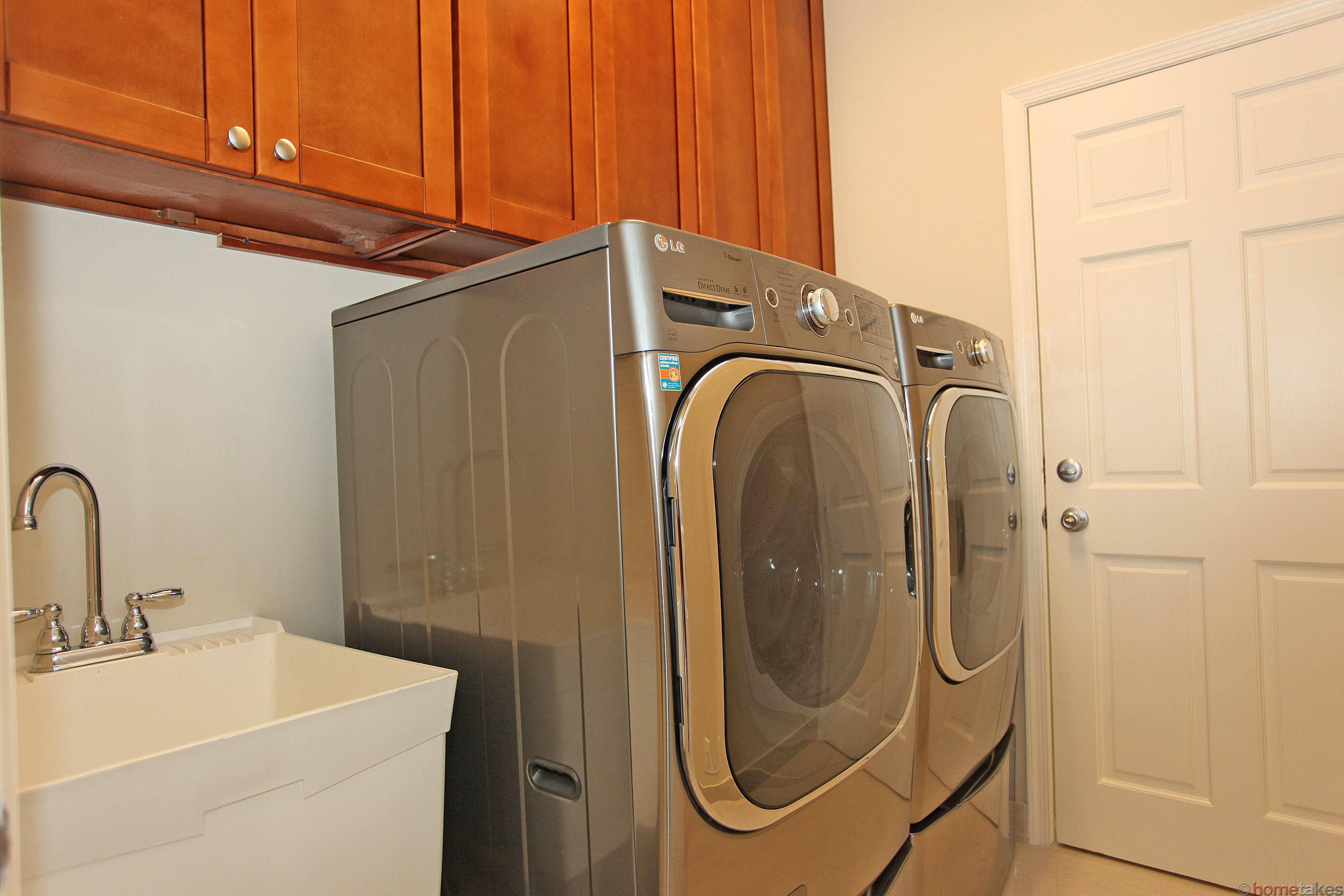 2469 Northwest 66th Drive Boca Raton, FL 33496 - Photo 12 of 15 a utility room with dryer and washer