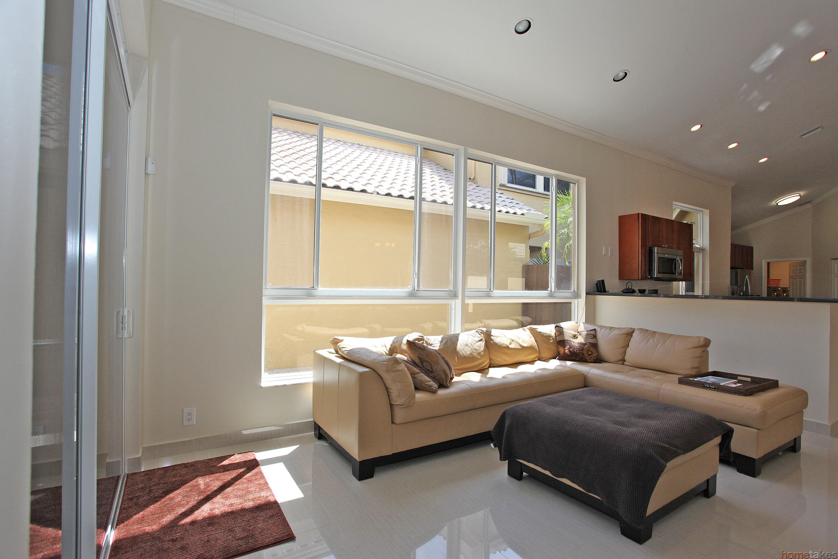2469 Northwest 66th Drive Boca Raton, FL 33496 - Photo 3 of 15 a living room with furniture and a window