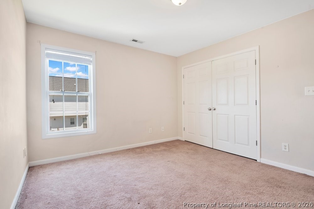 10 Pender Road Spring Lake, NC 28390 - Photo 19 of 35 a view of an empty room with a window