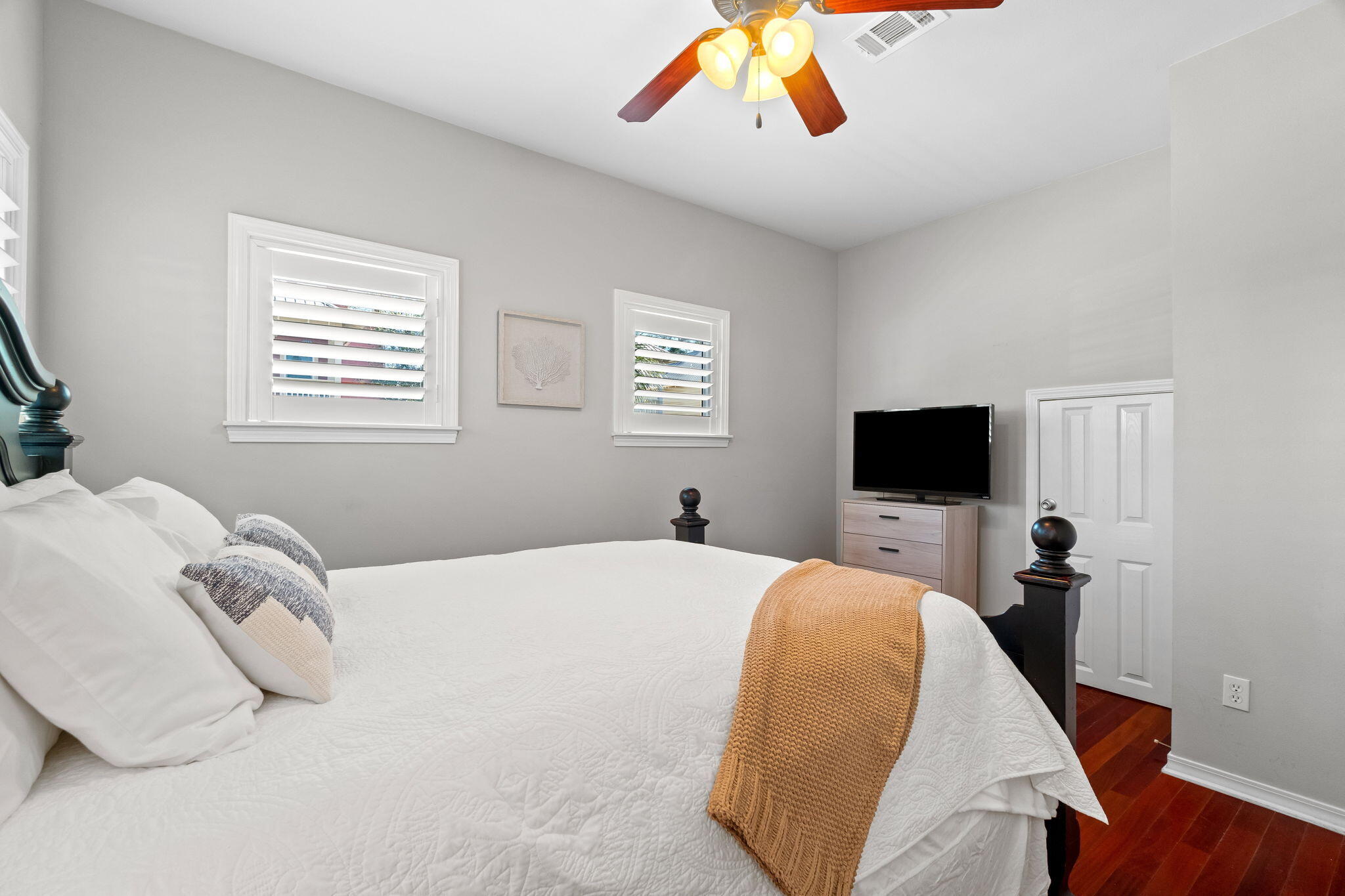 237 Hidden Lake Way Santa Rosa Beach, FL 32459 - Photo 11 of 41 a bedroom with a bed and a flat screen tv