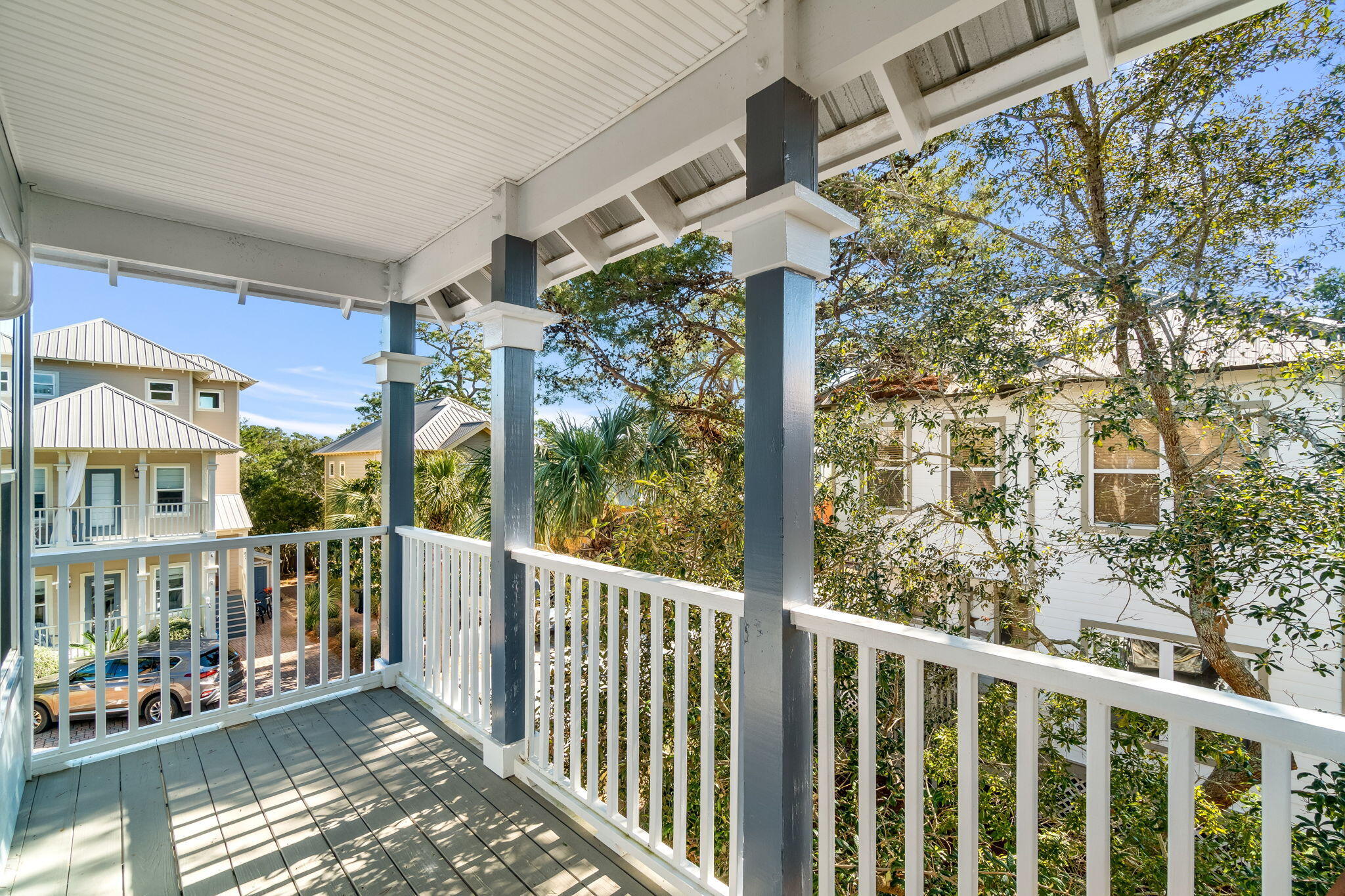 237 Hidden Lake Way Santa Rosa Beach, FL 32459 - Photo 21 of 41 a view of a porch with a small yard
