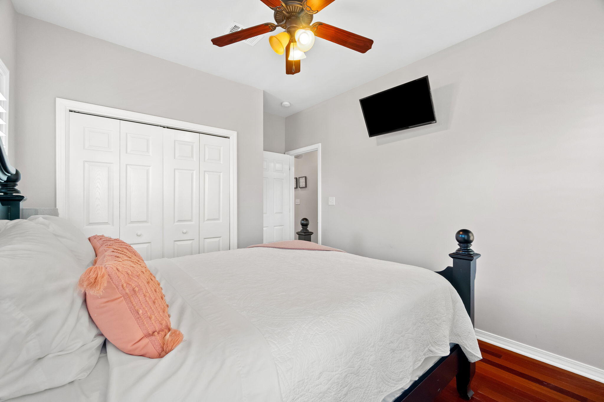 237 Hidden Lake Way Santa Rosa Beach, FL 32459 - Photo 24 of 41 a bedroom with a bed and a flat screen tv
