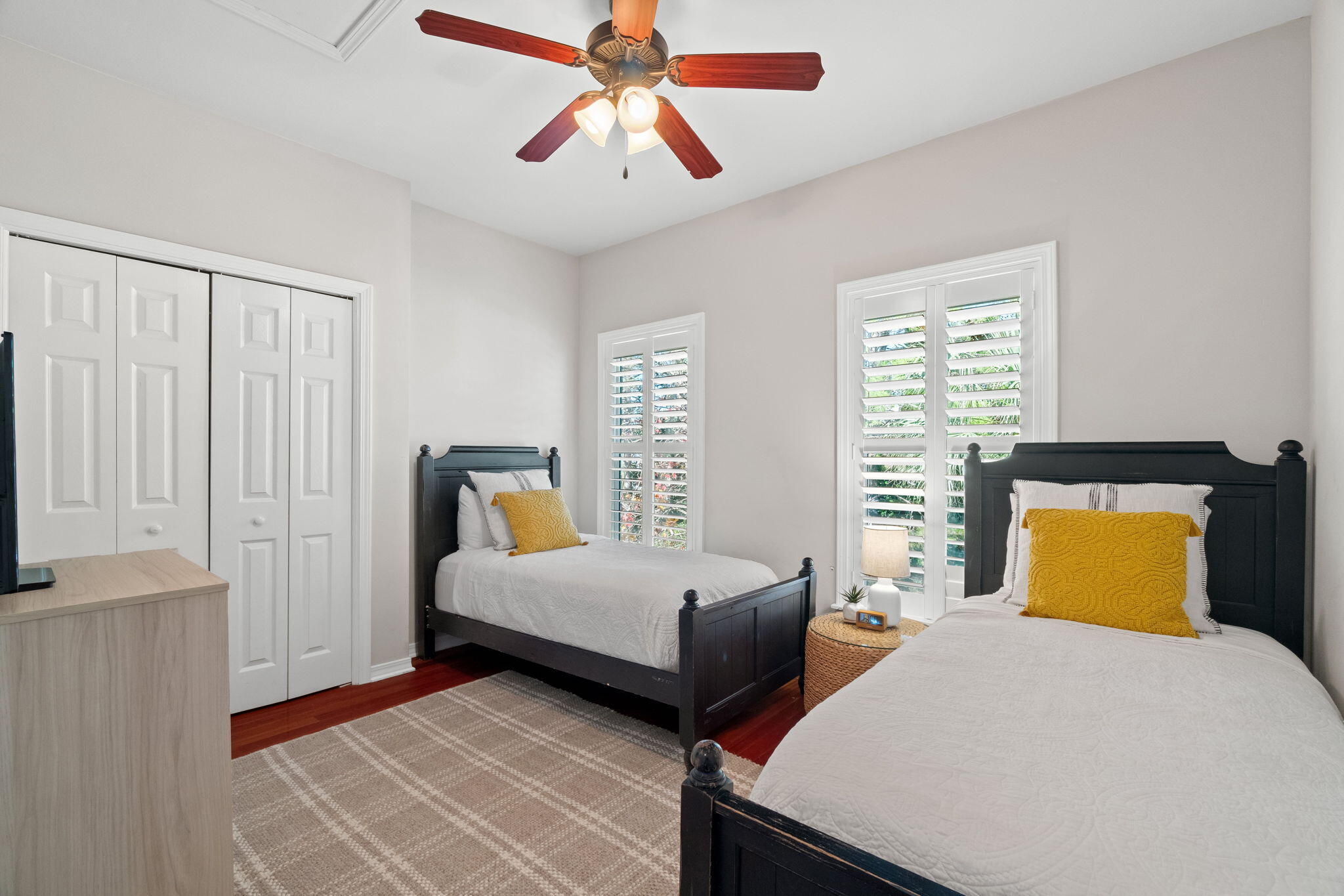 237 Hidden Lake Way Santa Rosa Beach, FL 32459 - Photo 26 of 41 a bedroom with a bed and a chandelier