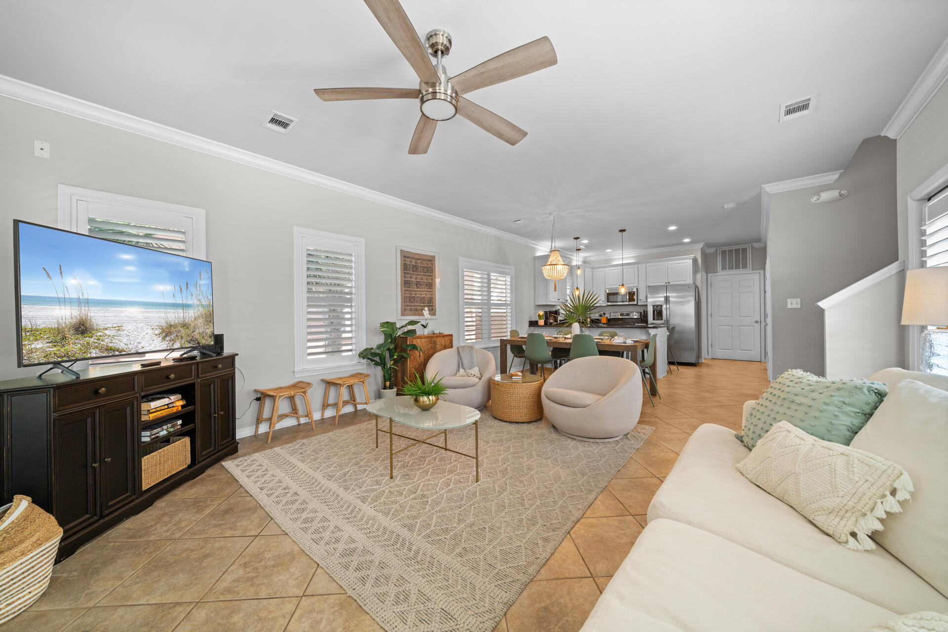 237 Hidden Lake Way Santa Rosa Beach, FL 32459 - Photo 7 of 41 a living room with furniture kitchen view and a large window