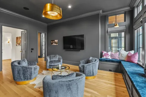 a living room with furniture and a window