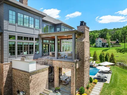 a kitchen with sink stove and cabinets