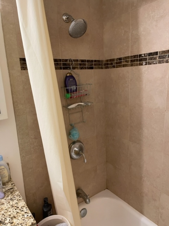2226 South Goebbert Road, Unit 270 Arlington Heights, IL 60005 - Photo 12 of 19 a bathroom with a sink and a mirror