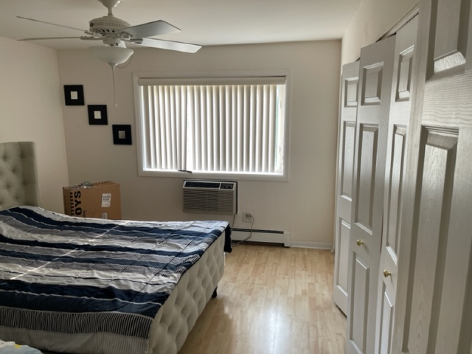 2226 South Goebbert Road, Unit 270 Arlington Heights, IL 60005 - Photo 14 of 19 a kitchen with stainless steel appliances granite countertop a refrigerator oven a sink and wooden floors