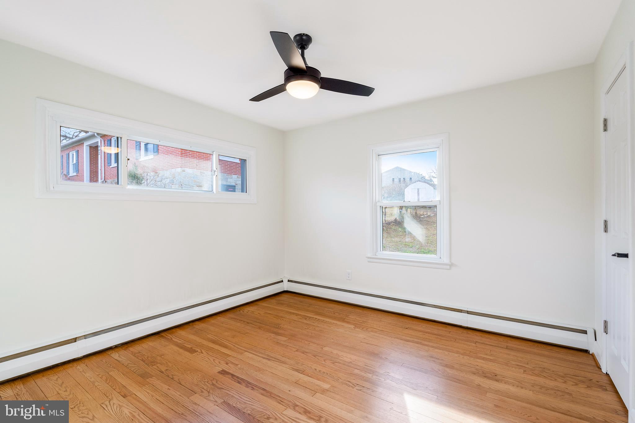 404 West Pearl Street Rising Sun, MD 21911 - Photo 12 of 23 a view of empty room with wooden floor