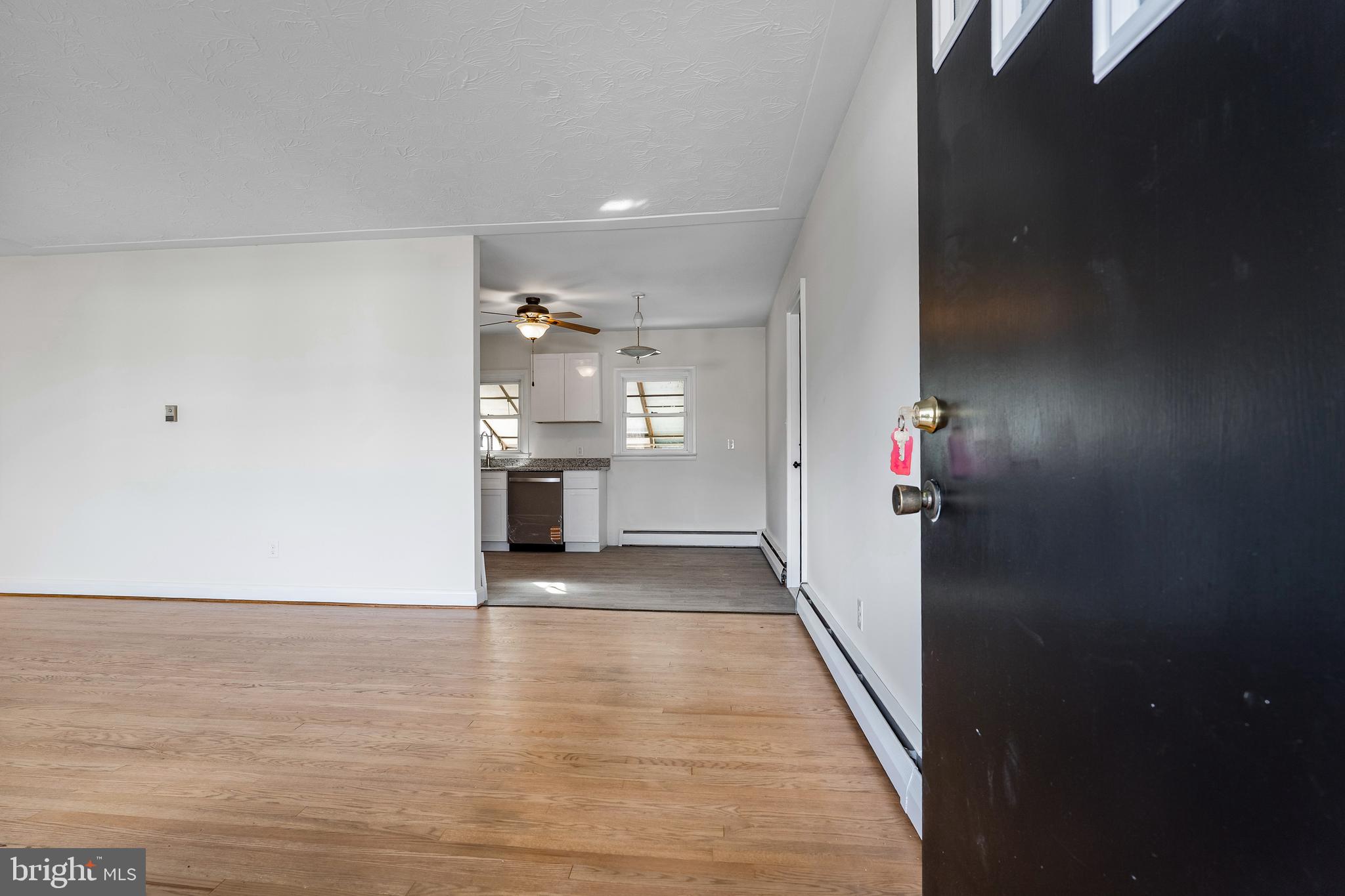 404 West Pearl Street Rising Sun, MD 21911 - Photo 6 of 23 a view of a hallway with wooden floor