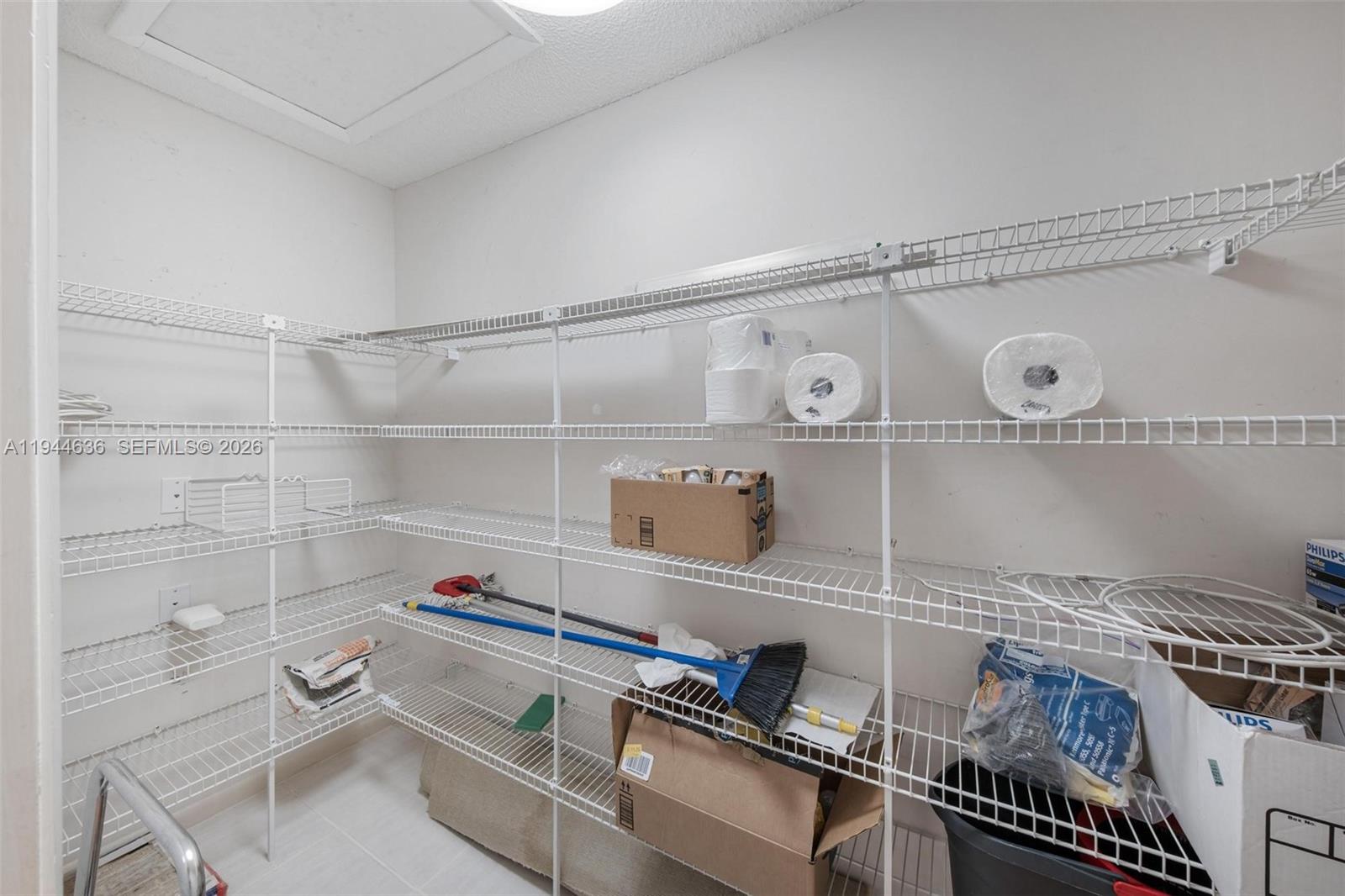 21877 Arriba Real Boca Raton, FL 33433 - Photo 24 of 40 a room with storage and utility racks