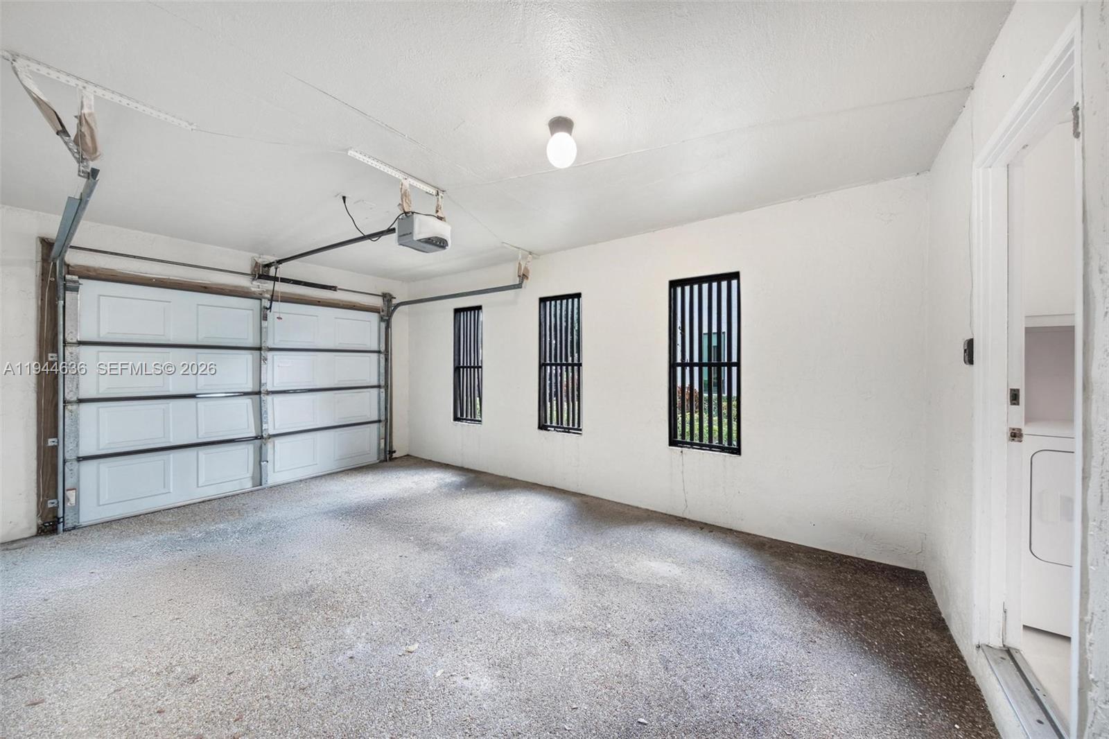 21877 Arriba Real Boca Raton, FL 33433 - Photo 29 of 40 a view of a garage