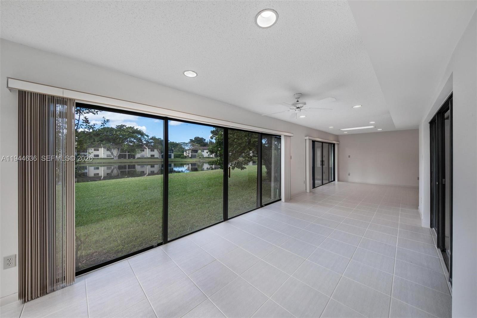 21877 Arriba Real Boca Raton, FL 33433 - Photo 8 of 40 a view of a room with a large window