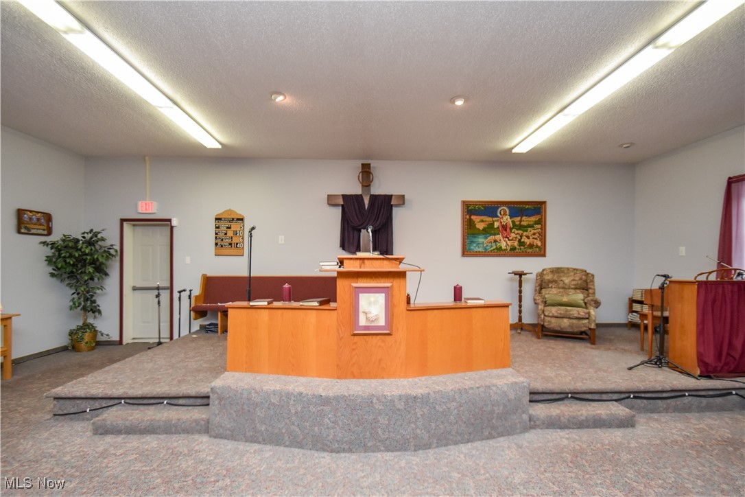 1187 Deforest Road Southeast Warren, OH 44484 - Photo 18 of 42 Reception area featuring a textured ceiling