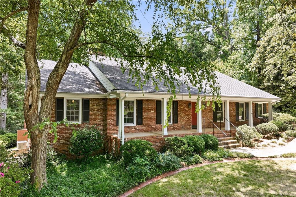 1281 Springdale Road Gainesville, GA 30501 - Photo 3 of 91 front view of a house with a yard