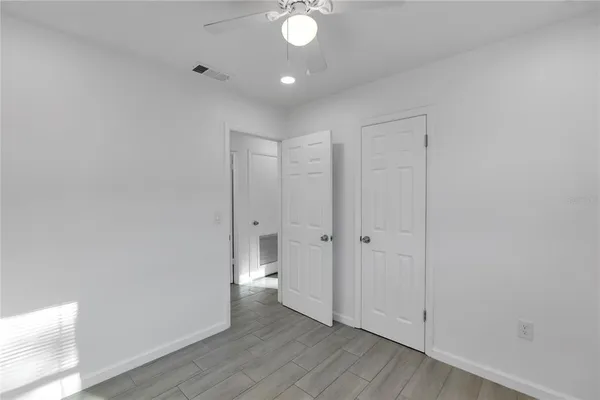 a view of a livingroom with wooden floor