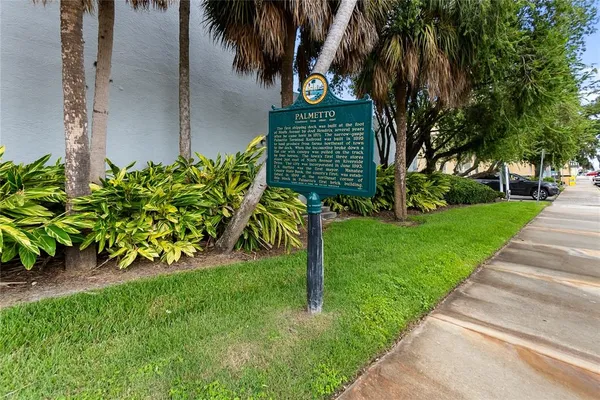a view of a garden with a fountain