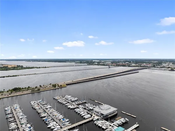 a view of balcony with wooden floor