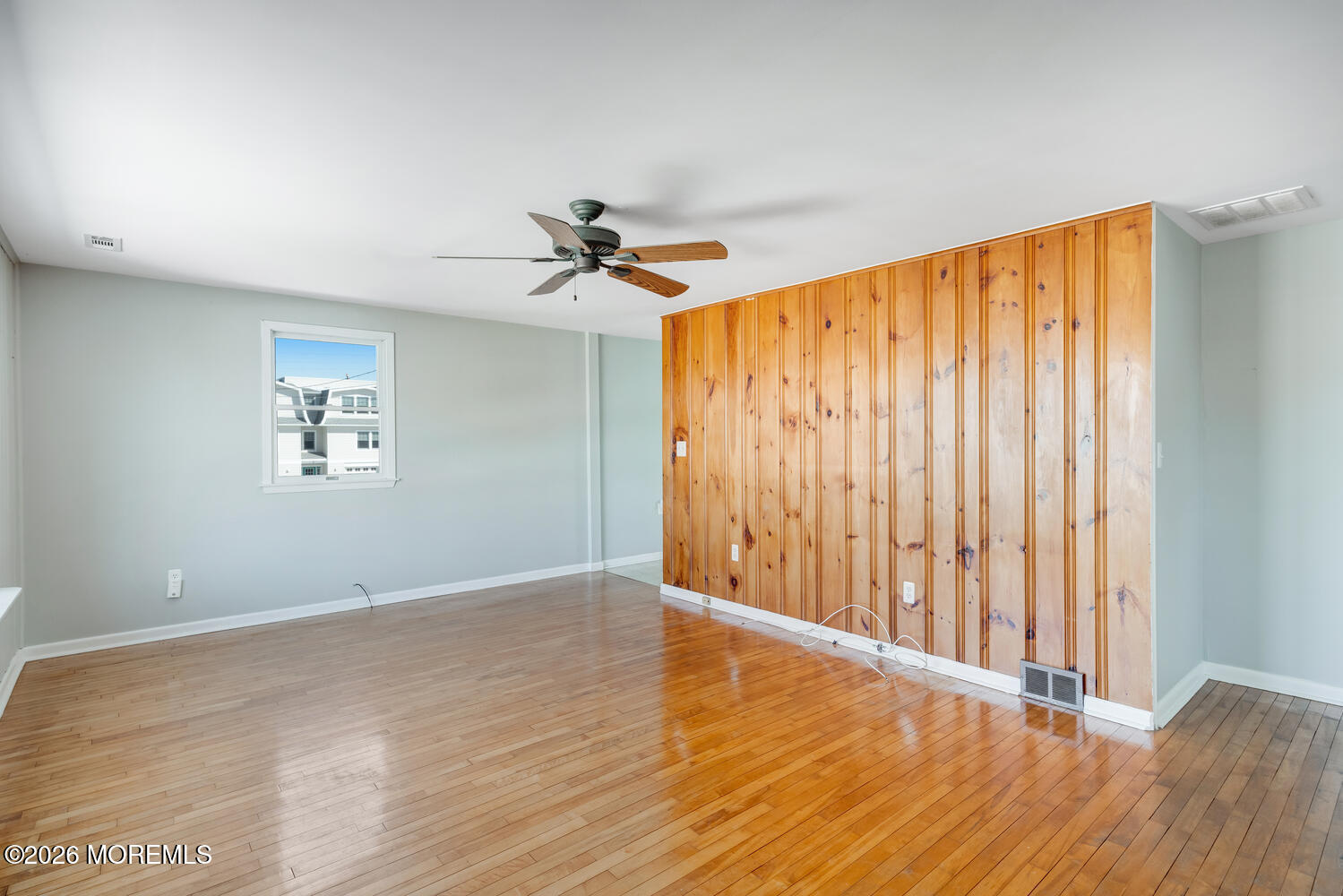 2402 R Central Avenue Barnegat Light, NJ 08006 - Photo 11 of 27 a view of an empty room with a window