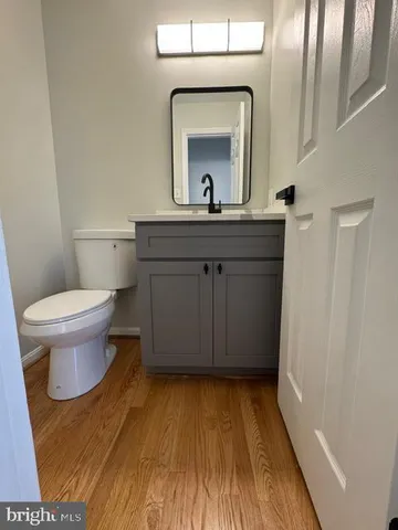 a view of hallway with wooden floor