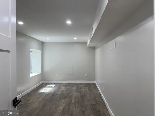 a kitchen with a sink stove and microwave