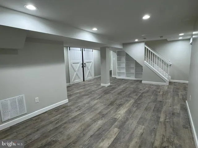 a utility room with cabinets
