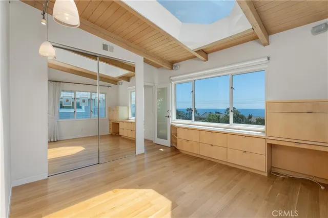 a view of a door and a window