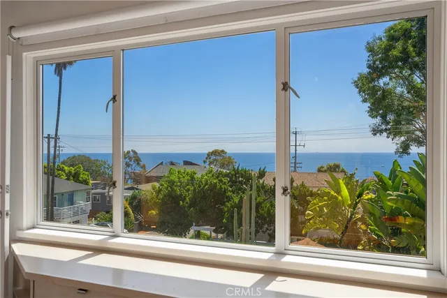 a spacious bathroom with a sink double vanity granite tub shower and a mirror