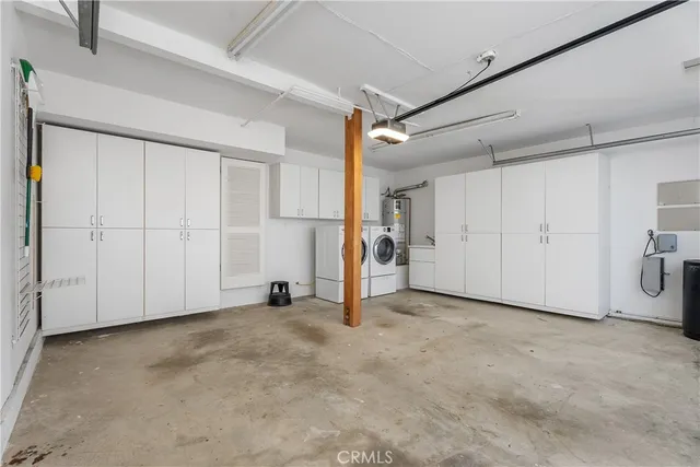 a view of a house with a potted plant and stairs
