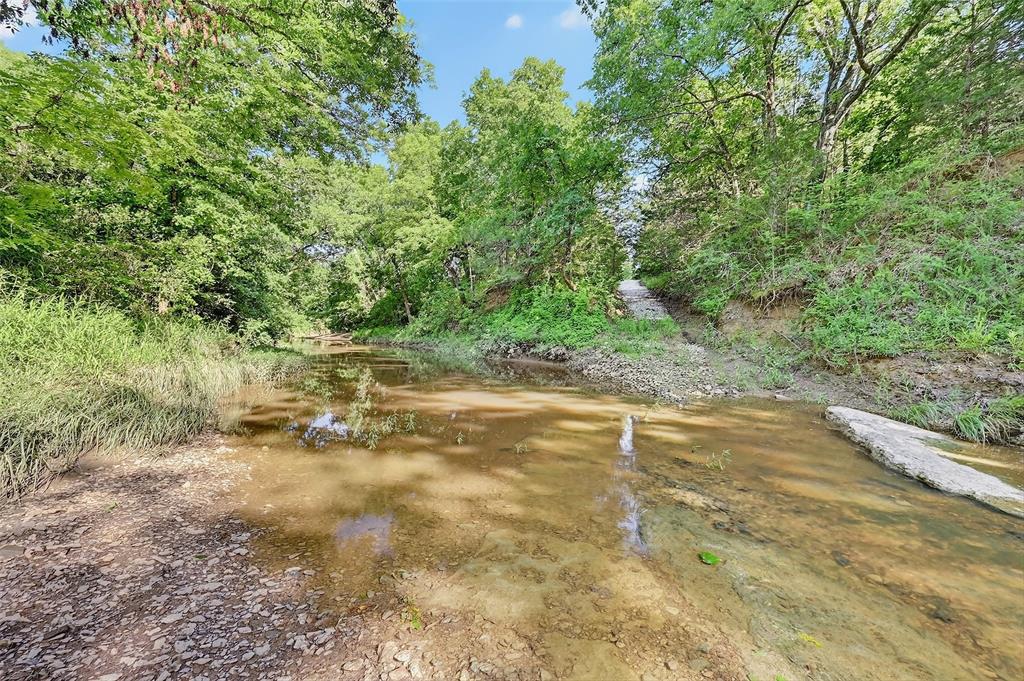 0 Fm-2383 Gainesville, TX 76240 - Photo 14 of 23 a view of a yard with a tree