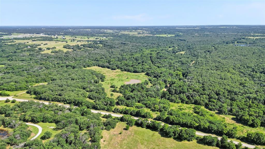 0 Fm-2383 Gainesville, TX 76240 - Photo 4 of 23 an aerial view of a houses with a yard