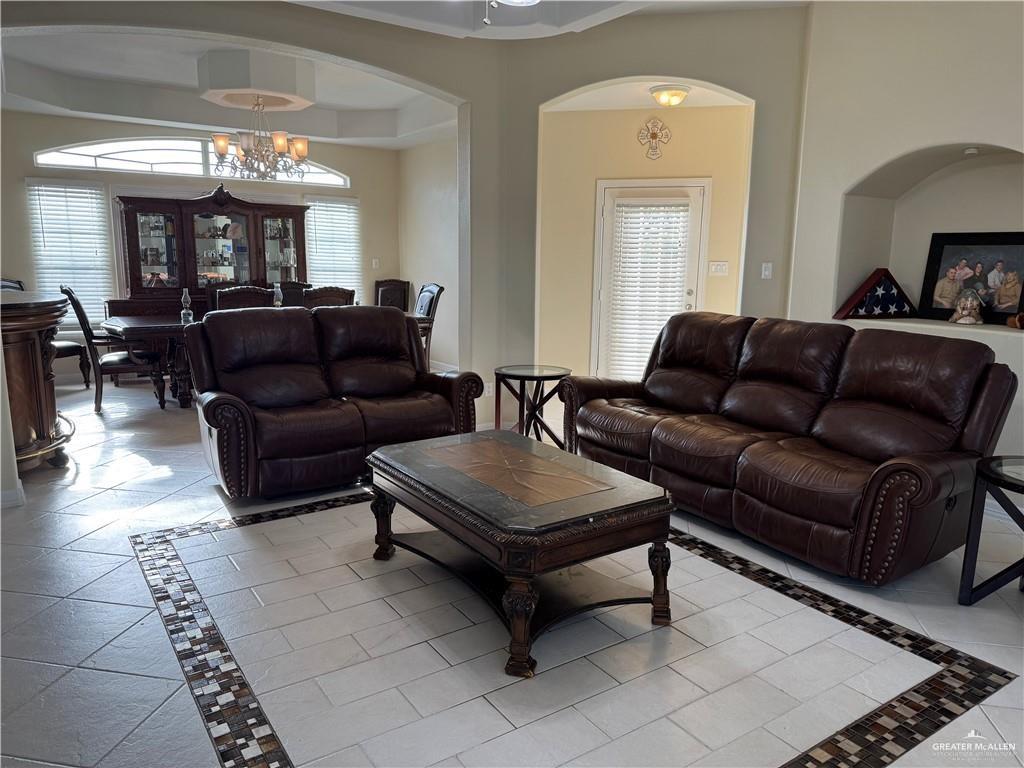 2600 Rhett Drive Pharr, TX 78577 - Photo 7 of 20 a living room with furniture and a chandelier