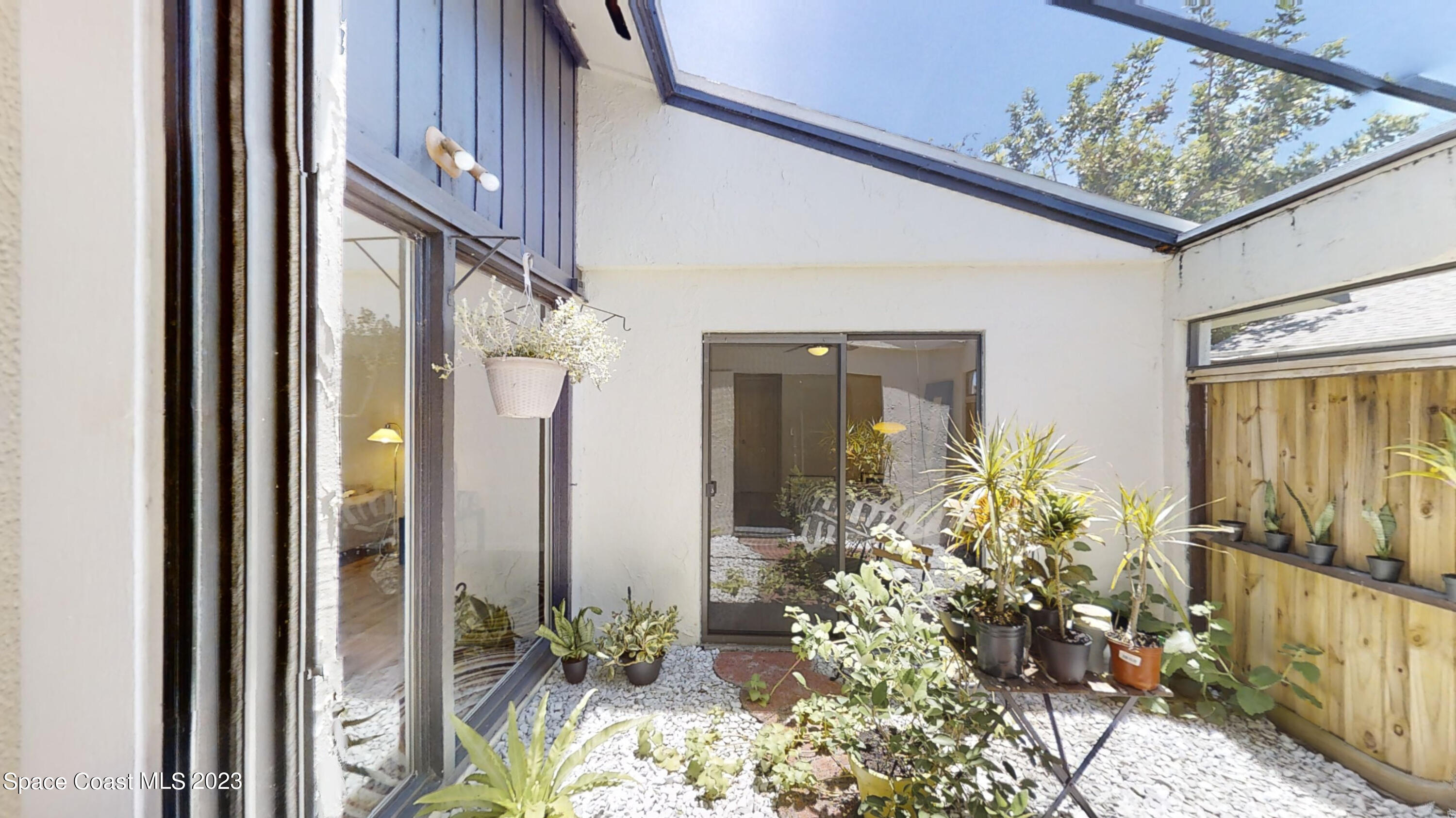 295 Bayhead Drive Melbourne, FL 32940 - Photo 12 of 19 a view of a potted plants on a balcony