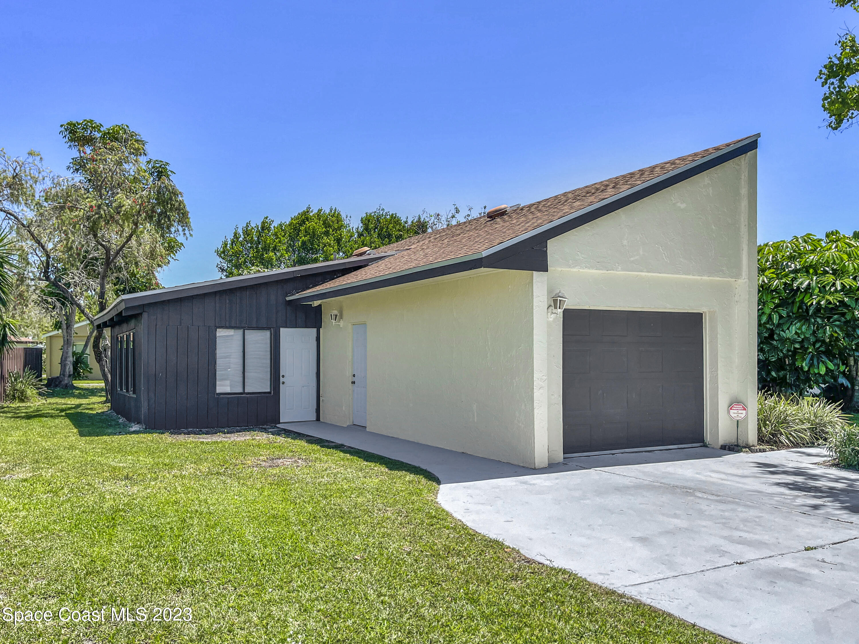 295 Bayhead Drive Melbourne, FL 32940 - Photo 2 of 19 a view of a backyard of the house