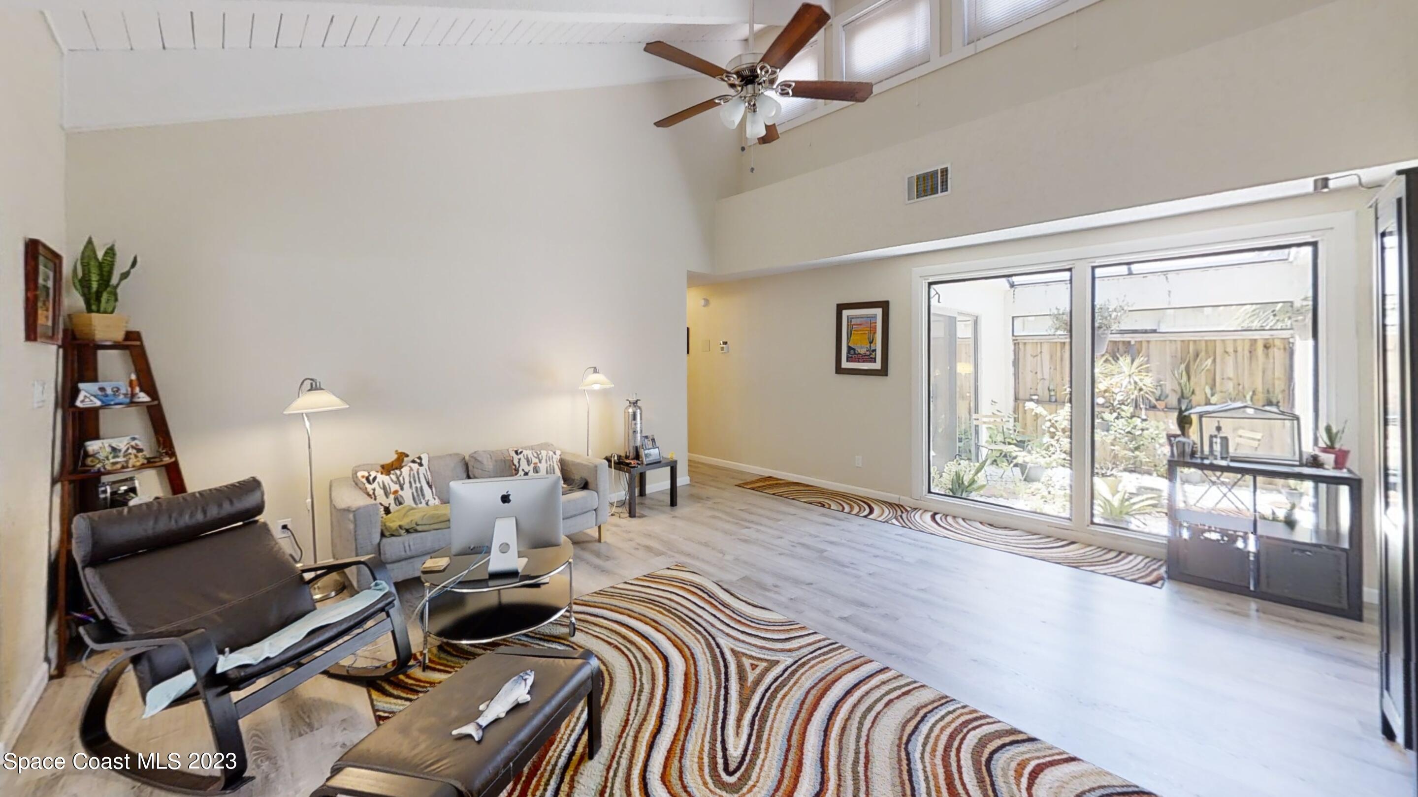 295 Bayhead Drive Melbourne, FL 32940 - Photo 9 of 19 a very nice looking room with a large window