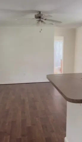 a view of a room with an empty space