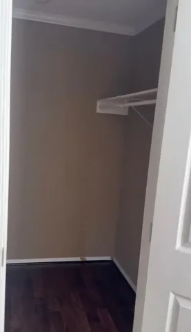 a view of small space with wooden floor