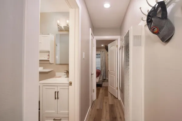 a bathroom with a sink and mirror