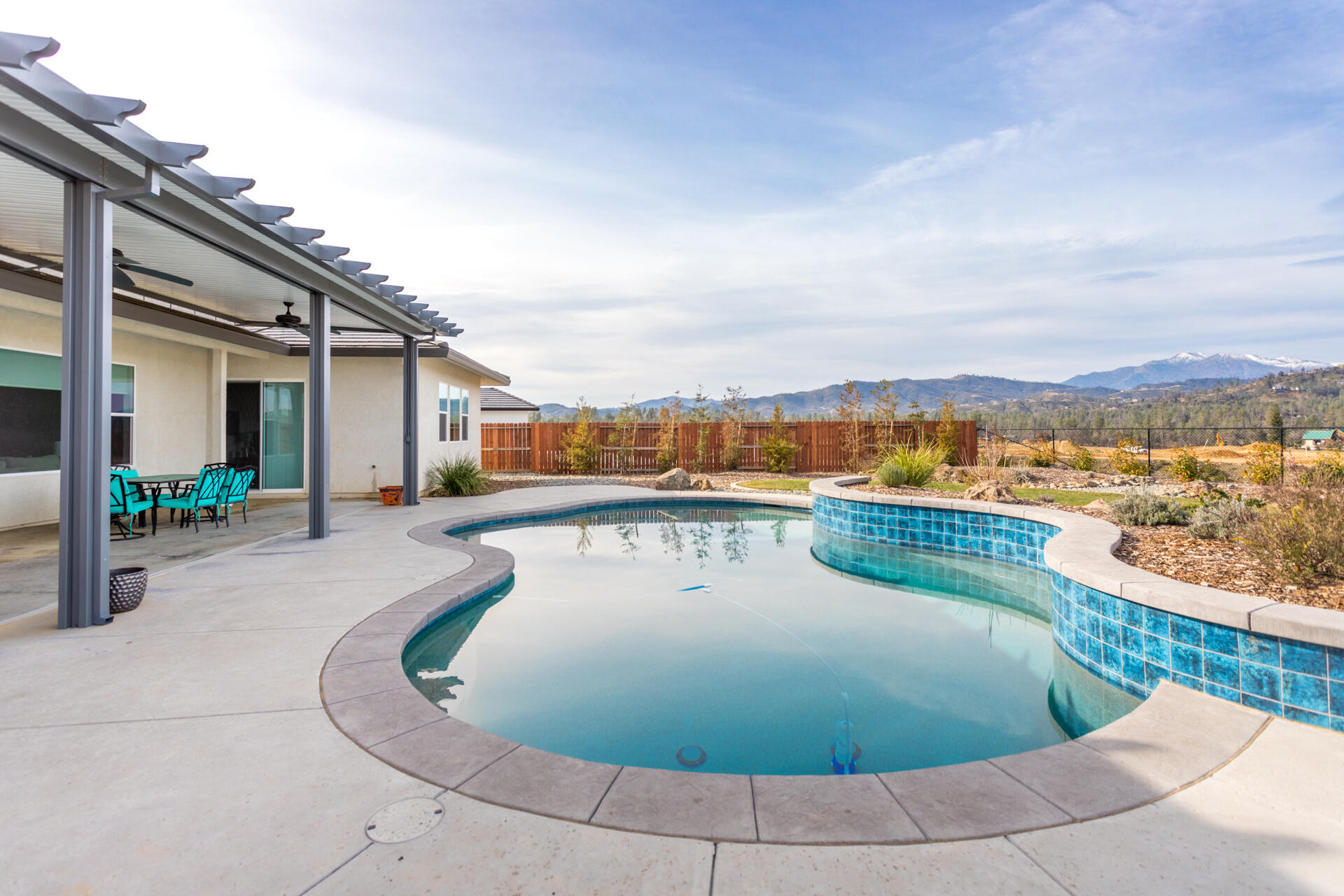 4720 Lower Springs Road Redding, CA 96001 - Photo 19 of 21 a view of a swimming pool with a lounge chair