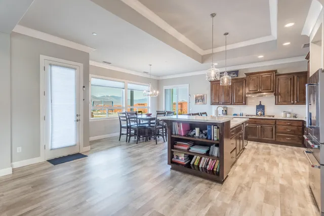 a view of a dining room with furniture window and outside view
