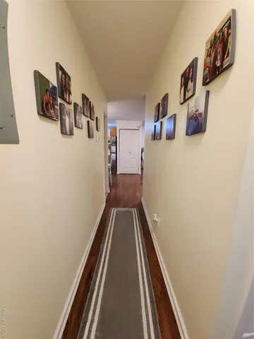 a view of a hallway with workspace