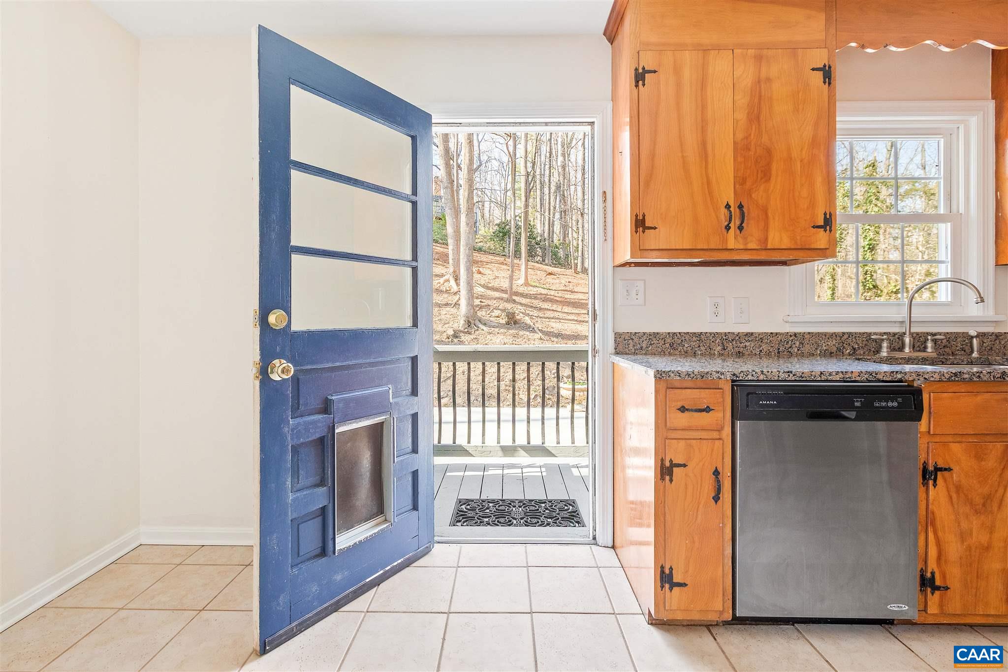 1600 Ricky Road Charlottesville, VA 22901 - Photo 12 of 34 a kitchen with stainless steel appliances granite countertop a stove and a refrigerator